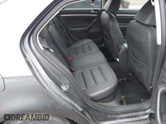 2009 Volkswagen Jetta SE with VIN 3VWRM71K19M049963, listed as a IAAI auction lot 42279906 with 157,290 mi miles and . Bid and sale history available at DreamBid. Image 8.