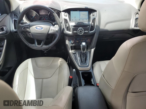 2016 Ford Focus Titanium with VIN 1FADP3J29GL274147, listed as a Copart auction lot 61377575 with 88,181 mi miles and Salvage title. Bid and sale history available at DreamBid. Image 8.