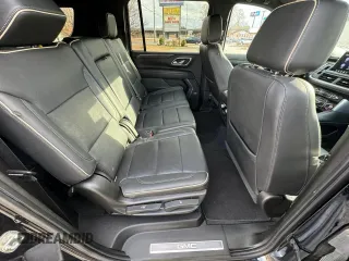 2021 GMC Yukon XL SLT with VIN 1GKS2GKDXMR238116, listed as a Copart auction lot 87132704 with 106,975 mi miles and Clean Title. Bid and sale history available at carsss.com. Image 6.