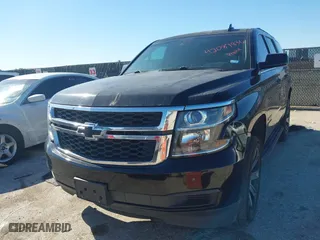 2015 Chevrolet Tahoe LT with VIN 1GNSCBKC2FR704344, listed as a IAAI auction lot 42087836 with 163,301 mi miles. Bid and sale history available at carsss.com. Image 2.