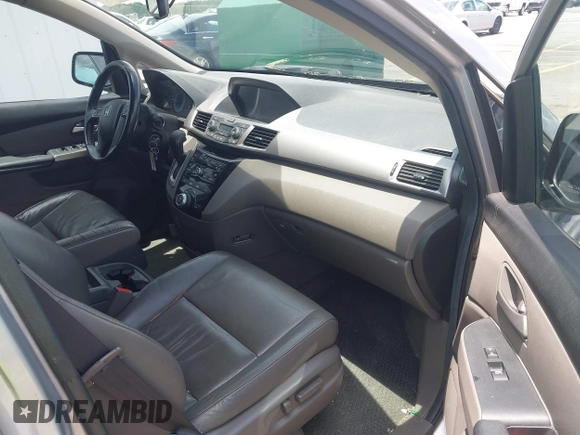 2012 Honda Odyssey EX-L with VIN 5FNRL5H65CB076534, listed as a IAAI auction lot 42440258 with 150,866 mi miles and . Bid and sale history available at DreamBid. Image 5.