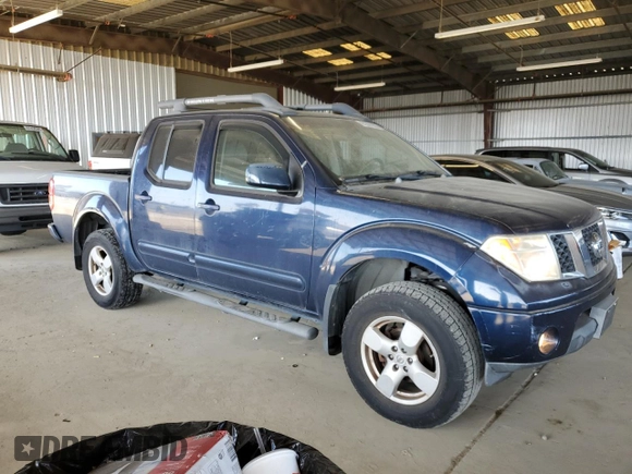 2007 Nissan Frontier Nismo z VIN 1N6AD07W77C439608, wystawiony jako Copart lot #61561905 z przebiegiem 148 797 mil mil oraz Czysty tytuł • Clean title. Historia ofert i sprzedaży dostępna na DreamBid. Obrazek 4.