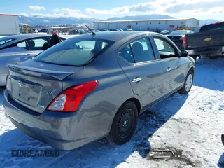 2016 Nissan Versa SV with VIN 3N1CN7APXGL872494, listed as a IAAI auction lot 41517757 with 64,612 mi miles. Bid and sale history available at carsss.com. Image 4.