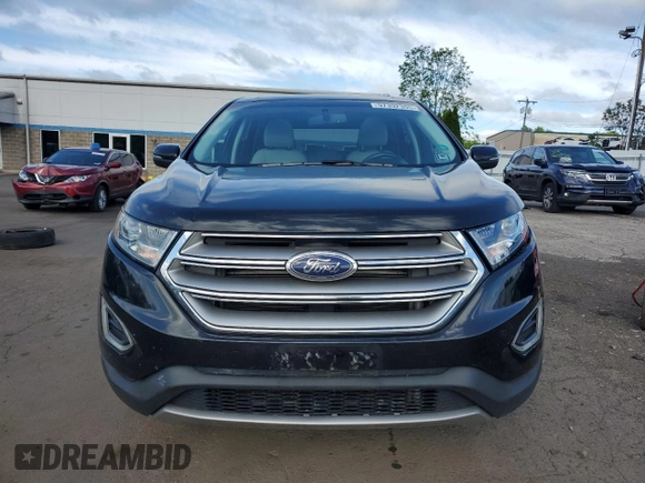 2015 Ford Edge Titanium z VIN 2FMTK4K86FBB88124, wystawiony jako Copart lot #57392305 z przebiegiem 95 698 mil mil oraz Szkoda całkowita • Salvage title. Historia ofert i sprzedaży dostępna na DreamBid. Obrazek 5.