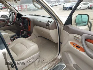 1999 Lexus LX 470 z VIN JT6HT00W8X0045705, wystawiony jako IAAI lot #42005587 z przebiegiem 443 758 mil mil oraz . Historia ofert i sprzedaży dostępna na DreamBid. Obrazek 5.
