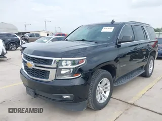 2019 Chevrolet Tahoe LT z VIN 1GNSCBKC0KR275635, wystawiony jako IAAI lot #42071241 z przebiegiem 158 621 mil mil oraz . Historia ofert i sprzedaży dostępna na DreamBid. Obrazek 2.