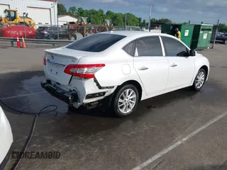 2015 Nissan Sentra SR with VIN 3N1AB7AP8FY257900, listed as a IAAI auction lot 42130428 with 153,060 mi miles and . Bid and sale history available at carsss.com. Image 4.
