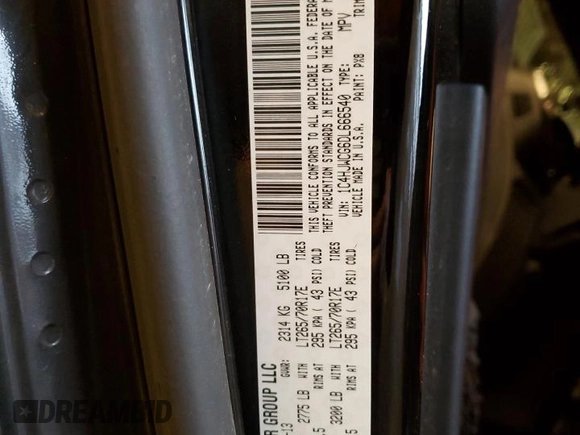 2013 Jeep Wrangler Rubicon with VIN 1C4HJWCG6DL666540, listed as a Copart auction lot 79337404 with 130,448 mi miles and Salvage title. Bid and sale history available at DreamBid. Image 13.