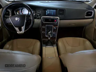 2015 Volvo S60 T5 Drive-E Premier z VIN YV140MFB1F1317431, wystawiony jako Copart lot #56203985 z przebiegiem 166 350 mil mil oraz Szkoda całkowita • Salvage title. Historia ofert i sprzedaży dostępna na DreamBid. Obrazek 8.