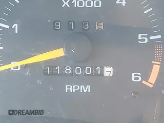 1997 GMC Jimmy SLS with VIN 1GKDT13WXV2567802, listed as a IAAI auction lot 41808103 with 118,001 mi miles. Bid and sale history available at carsss.com. Image 7.