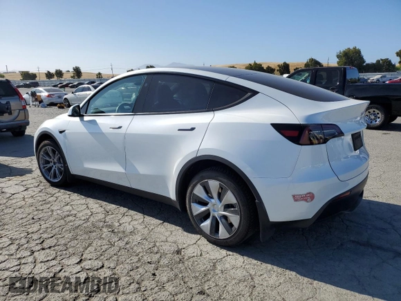 2024 Tesla Model Y Long Range с VIN 7SAYGDEE8RF983067, выставлен на аукционе Copart как лот 61217015 с пробегом 57 082 миль миль и Списание • Salvage title. История ставок и продаж доступна на DreamBid. Изображение 2.