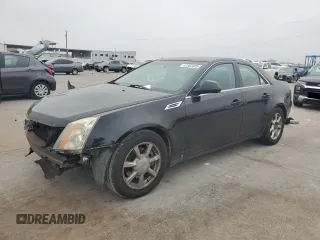 2009 Cadillac CTS RWD w/1SA with VIN 1G6DF577190153034, listed as a Copart auction lot 42562805 with 128,955 mi miles and Salvage Title. Bid and sale history available at carsss.com. Image 1.