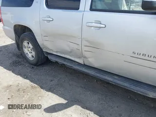 2013 Chevrolet Suburban LT with VIN 1GNSKJE78DR108955, listed as a IAAI auction lot 42004032 with 114,729 mi miles and . Bid and sale history available at DreamBid. Image 17.