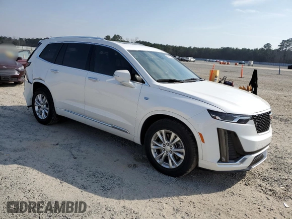 2024 Cadillac XT6 FWD Luxury with VIN 1GYKPAR47RZ705252, listed as a Copart auction lot 49244015 with 26,838 mi miles and Salvage title. Bid and sale history available at DreamBid. Image 4.