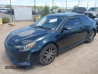 2015 Scion tC z VIN JTKJF5C74FJ003875, wystawiony jako IAAI lot #42184426 z przebiegiem 81 248 mil mil oraz . Historia ofert i sprzedaży dostępna na DreamBid. Obrazek 2.