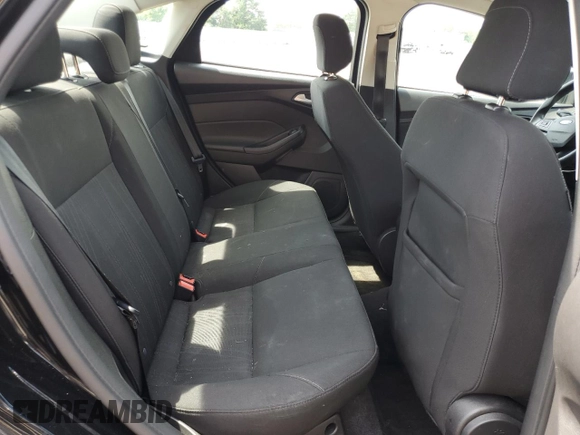 2018 Ford Focus SE z VIN 1FADP3F2XJL276652, wystawiony jako Copart lot #57499965 z przebiegiem 112 388 mil mil oraz Szkoda całkowita • Salvage title. Historia ofert i sprzedaży dostępna na DreamBid. Obrazek 10.