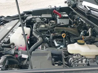 2024 Toyota Tacoma SR5 z VIN 3TMKB5FN2RM000305, wystawiony jako IAAI lot #42108145 z przebiegiem Nie podano mil oraz . Historia ofert i sprzedaży dostępna na DreamBid. Obrazek 14.