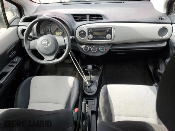2012 Toyota Yaris L with VIN JTDKTUD32CD517695, listed as a Copart auction lot 57392355 with 201,711 mi miles and Salvage title. Bid and sale history available at DreamBid. Image 8.