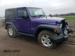 2017 Jeep Wrangler Willys Wheeler with VIN 1C4AJWAG0HL641188, listed as a Copart auction lot 52814005 with 94,959 mi miles and Salvage Title. Bid and sale history available at DreamBid. Image 4.