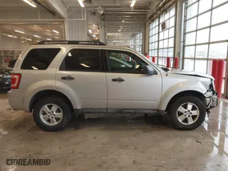 2010 Ford Escape XLT with VIN 1FMCU0D70AKB09942, listed as a IAAI auction lot 41572582 with 218,296 mi miles. Bid and sale history available at carsss.com. Image 14.