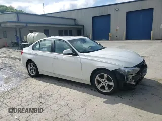 2013 BMW 3 Series 320i xDrive with VIN WBA3C3C57DF980971, listed as a Copart auction lot 57441155 with 131,263 mi miles and Salvage title. Bid and sale history available at DreamBid. Image 14.