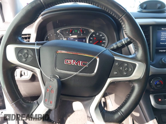 2020 GMC Acadia SLT with VIN 1GKKNMLS4LZ136098, listed as a IAAI auction lot 41618272 with 100,486 mi miles and . Bid and sale history available at DreamBid. Image 11.