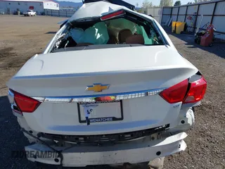 2014 Chevrolet Impala LTZ with VIN 2G1155S30E9204877, listed as a IAAI auction lot 42056615 with Not Provided miles and . Bid and sale history available at DreamBid. Image 15.