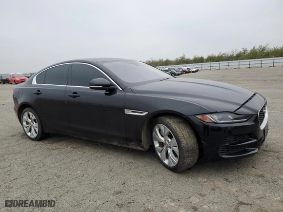 2020 Jaguar XE S with VIN SAJAE4FX1LCP61707, listed as a Copart auction lot 84244354 with NaN miles and Salvage Title. Bid and sale history available at carsss.com. Image 4.