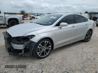2019 Ford Fusion Titanium with VIN 3FA6P0D99KR105398, listed as a Copart auction lot 54786845 with 122,776 mi miles and Salvage title. Bid and sale history available at DreamBid. Image 1.