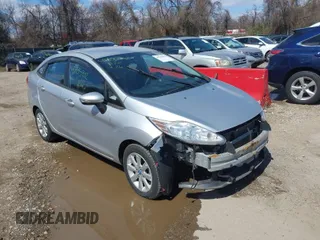 2013 Ford Fiesta SE with VIN 3FADP4BJ2DM173456, listed as a IAAI auction lot 41785902 with 87,004 mi miles. Bid and sale history available at carsss.com. Image 1.