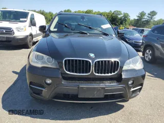2012 BMW X5 35i with VIN 5UXZV4C54CL752079, listed as a Copart auction lot 62147515 with 147,244 mi miles and Clean title. Bid and sale history available at DreamBid. Image 5.