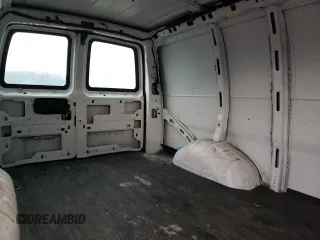 2019 Chevrolet Express Cargo с VIN 1GCWGAFPXK1143678, выставлен на аукционе Copart как лот 88565115 с пробегом 89 352 миль миль и Списание • Salvage title. История ставок и продаж доступна на DreamBid. Изображение 11.