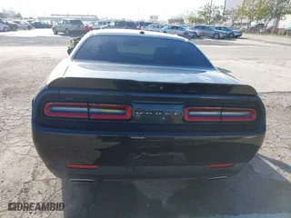 2021 Dodge Challenger SXT with VIN 2C3CDZAG9MH630736, listed as a IAAI auction lot 41633520 with 62,895 mi miles. Bid and sale history available at carsss.com. Image 17.