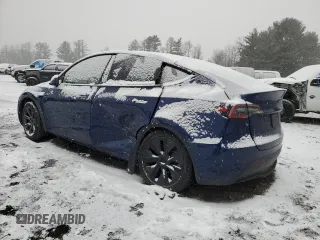 2024 Tesla Model Y Long Range with VIN 7SAYGAEE0RF184074, listed as a Copart auction lot 44333645 with 11,403 mi miles and Salvage Title. Bid and sale history available at DreamBid. Image 2.