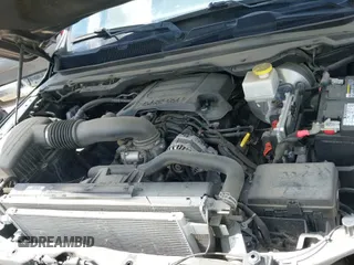 2020 Ram 1500 Lone Star z VIN 1C6RREFT7LN121697, wystawiony jako IAAI lot #42212622 z przebiegiem 117 999 mil mil oraz . Historia ofert i sprzedaży dostępna na DreamBid. Obrazek 24.