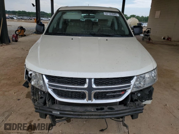 2013 Dodge Journey American Value with VIN 3C4PDCAB5DT656997, listed as a Copart auction lot 57123565 with 201,799 mi miles and Salvage title. Bid and sale history available at DreamBid. Image 5.