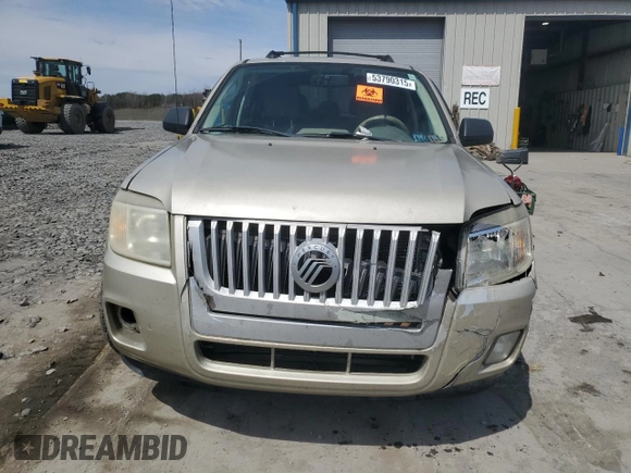 2010 Mercury Mariner z VIN 4M2CN9BG0AKJ17705, wystawiony jako Copart lot #53790315 z przebiegiem 154 832 mil mil oraz Szkody całkowita. Historia ofert i sprzedaży dostępna na DreamBid. Obrazek 5.