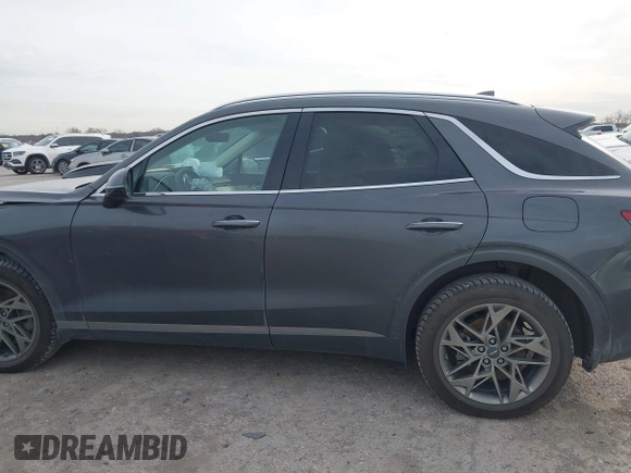 2022 Genesis GV70 2.5T with VIN KMUMADTB2NU065058, listed as a IAAI auction lot 41707351 with 77,831 mi miles and . Bid and sale history available at DreamBid. Image 14.