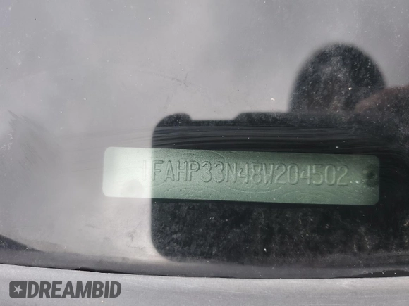 2008 Ford Focus SE z VIN 1FAHP33N48W204502, wystawiony jako Copart lot #53145615 z przebiegiem Nie podano mil oraz Szkoda całkowita • Salvage title. Historia ofert i sprzedaży dostępna na DreamBid. Obrazek 14.