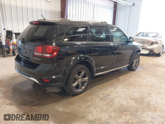 2016 Dodge Journey Crossroad Plus z VIN 3C4PDCGB6GT107739, wystawiony jako IAAI lot #41973252 z przebiegiem 142 713 mil mil oraz . Historia ofert i sprzedaży dostępna na DreamBid. Obrazek 4.