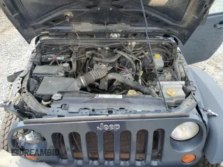 2007 Jeep Wrangler Unlimited X with VIN 1J4GA39117L119395, listed as a Copart auction lot 52588055 with 160,335 mi miles and Salvage title. Bid and sale history available at DreamBid. Image 11.