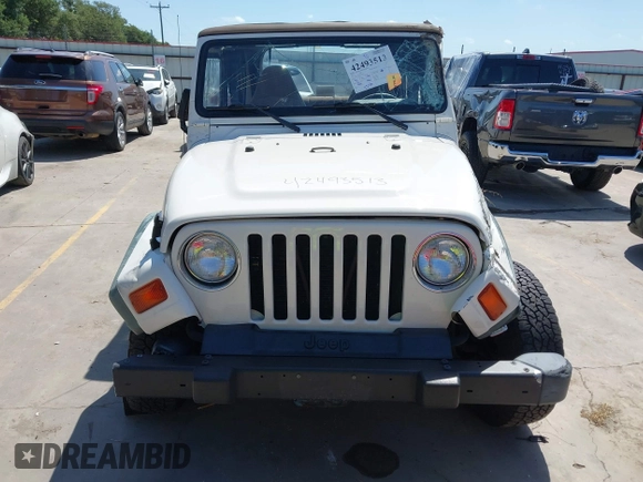 1998 Jeep Wrangler Sport z VIN 1J4FY19S3WP776209, wystawiony jako IAAI lot #42493513 z przebiegiem 113 130 mil mil oraz . Historia ofert i sprzedaży dostępna na DreamBid. Obrazek 12.
