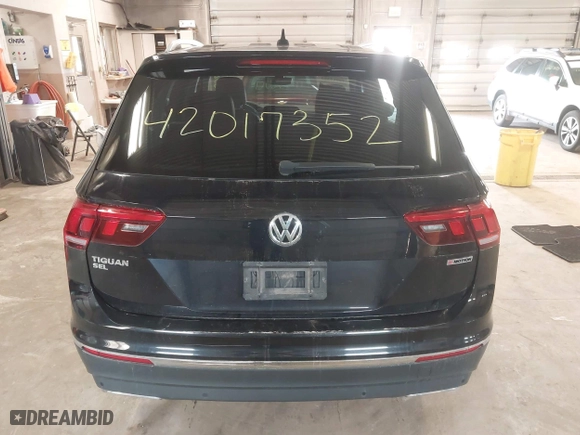 2020 Volkswagen Tiguan SE with VIN 3VV2B7AX4LM115131, listed as a IAAI auction lot 42017352 with 87,909 mi miles. Bid and sale history available at carsss.com. Image 16.