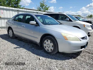 2004 Honda Accord LX z VIN 1HGCM56344A075057, wystawiony jako Copart lot #58235565 z przebiegiem 224 765 mil mil oraz Szkoda całkowita • Salvage title. Historia ofert i sprzedaży dostępna na DreamBid. Obrazek 4.
