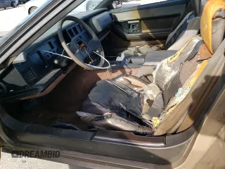 1985 Chevrolet Corvette with VIN 1G1YY0785F5124812, listed as a Copart auction lot 60605264 with 880,422 mi miles and Salvage Title. Bid and sale history available at carsss.com. Image 7.