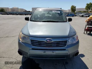 2009 Subaru Forester X with VIN JF2SH61619H757609, listed as a Copart auction lot 65048765 with 106,139 mi miles and Salvage title. Bid and sale history available at DreamBid. Image 5.