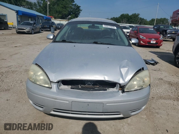 2004 Ford Taurus SE with VIN 1FAFP53U04G133586, listed as a Copart auction lot 59972925 with 228,938 mi miles and Salvage title. Bid and sale history available at DreamBid. Image 5.