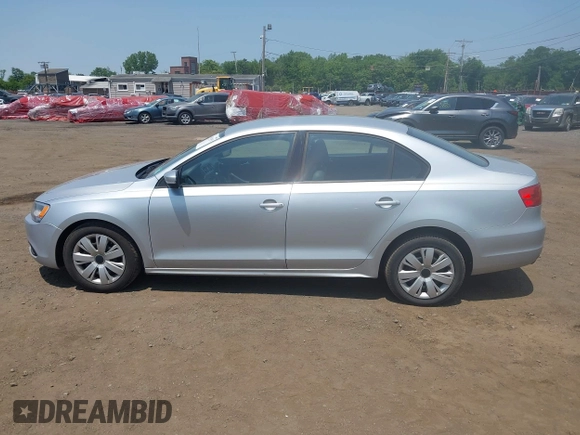 2012 Volkswagen Jetta SE z VIN 3VWDP7AJ5CM309927, wystawiony jako IAAI lot #42414951 z przebiegiem 128 109 mil mil oraz . Historia ofert i sprzedaży dostępna na DreamBid. Obrazek 14.