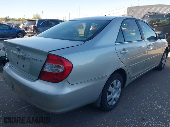 2004 Toyota Camry LE z VIN JTDBE32K040263783, wystawiony jako IAAI lot #42066013 z przebiegiem 204 531 mil mil oraz . Historia ofert i sprzedaży dostępna na DreamBid. Obrazek 4.