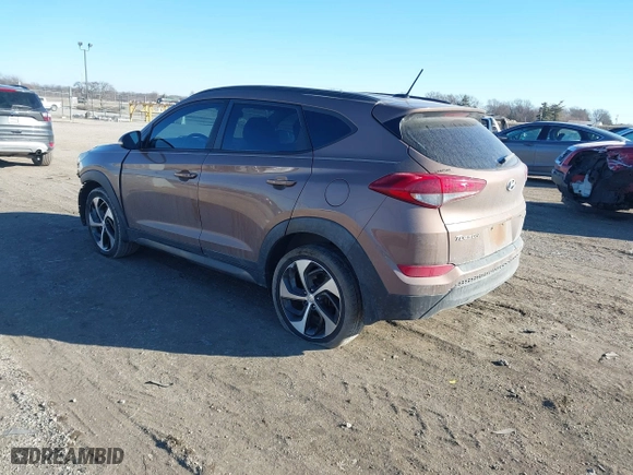 2016 Hyundai Tucson Sport with VIN KM8J33A20GU183234, listed as a IAAI auction lot 41429777 with 113,077 mi miles. Bid and sale history available at carsss.com. Image 3.